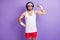 Photo of crazy funny sportsman puffed cheeks demonstrate muscle wear glasses sportswear isolated purple background