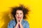 Photo of crazy lady palms cheeks open mouth yell noisy loud wear jeans shirt isolated yellow color background