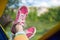 Photo of crossed female legs in pink sneakers in tent