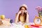 Photo of crying student girl sitting at desk with exercise books