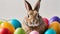 Photo Of Curious, Cute And Funny Easter Bunny Or Easter Rabbit Peeking Behind A Pile Of Painted Decorated Or Ornate. Generative AI