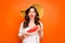 Photo of curly casual wavy nice girlish feminine youngster holding a wedge of watermelon blinking at you isolated over