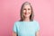 Photo of cute elder grey hairdo lady wear blue blouse isolated on pink color background