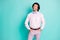 Photo of cute interested wavy hair gentleman dressed pink looking empty space hands arms pockets isolated turquoise