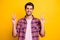 Photo of cute person treating all people around well showing v-sign while isolated with yellow background