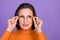 Photo of cute thoughtful lady pensioner dressed orange turtleneck arms glasses looking emty space smiling isolated