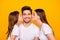 Photo of dad mom and small foxy lady kissing daddy happy together wear casual outfit isolated yellow background