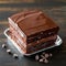 Photo Decadent chocolate cake topped with smooth ganache, irresistible dessert