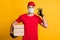 Photo of delivery man hold pile carton boxes show okey wear mask red t-shirt hat isolated yellow color background