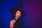 Photo of devil seductive mysterious woman wear witch dress headwear empty space isolated dark gradient color background