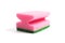Photo of a dish sponge that consists of pink foam and green abrasive on a white background