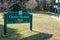 The photo displays a sign for Queen Elizabeth Park located in downtown Vancouver