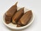 Photo of Dodol or jenang or nian gao is traditional snack from Java, Indonesia isolated on white background.