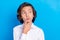 Photo of doubtful funny schoolboy wear formal clothes arm chin looking empty space  blue color background