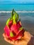 Photo Dragon fruit on the background of the sea on the beach in Thailand