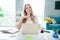 Photo of dreamy lovely woman thinking planning working day hiring applicants sitting on workstation