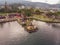 Photo from the drone. Aerial view of Pura Ulun Danu Bratan, Bali. Hindu temple surrounded by flowers on Bratan lake