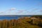 Photo from the drone, a beautiful view from a height of the forest and lake in the fall