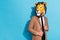 Photo of eccentric weird guy in lion mask look good virile empty space  over blue color background
