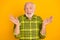 Photo of elderly man happy positive smile gesture hands questioned no answer isolated over yellow color background