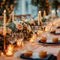 Photo Elegance in details table setting with flowers and glowing candles