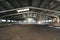 Photo of an empty indoor riding hall for horses and riders