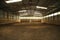 Photo of an empty indoor riding hall for horses and riders