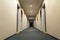 Photo of empty passageway corridor in luxury house