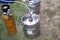 photo of Equipment for the production of beer. new a keg with fresh beer. metal beer keg container working in street festival.