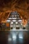 Photo of escalators in beautiful metro station in Stockholm, Sweden. Exposed illuminated rock in tunnel