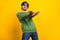 Photo of excited carefree cool guy enjoy party dance wear sunglass green sweater isolated yellow color background