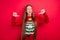 Photo of excited crazy confident girl direct finger herself boasting wear ugly pullover isolated red color background