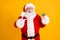 Photo excited grey white beard hair santa claus shopper point finger credit card recommend buy x-mas eve tradition