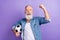 Photo of excited man happy positive smile hold soccer ball celebrate victory fists hand isolated over violet color