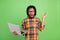 Photo of excited programmer guy hold pc open mouth wear checkered shirt isolated green color background