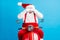 Photo of excited santa claus ride scooter x-mas magic surprise christmas stylish modern party close cover hands eyes