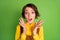 Photo of excited surprised girl palms face wear yellow shirt overall isolated green color background
