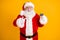 Photo fat white grey hair beard santa claus point finger credit card best choice x-mas eve noel christmas magic party