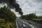 Photo of a fire in next to a motorway