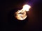 Photo of flame from burning plastic waste in a small aluminum bowl?