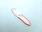 Photo Flat Lay Plastic Pregnancy test pack positive result at texturized Blue Paper Background