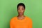 Photo of flirty millennial short hairdo lady blow kiss wear orange pullover isolated on green color background