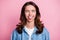 Photo of fooling cheerful cute young woman stick out tongue grimace isolated on pastel pink color background