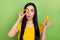 Photo of fooling impressed woman wear yellow t-shirt holding tropical fruit cover eye lips plump isolated green color