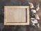 Photo frame with marine nautical decoration on wooden background