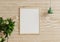 Photo frame mockup on a beautiful wooden wall in the living room With hanging lamps and flower pots on the side.3d rendering