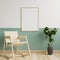 Photo frame mockup on a white and green wall in the living room. With rocking chairs and plant pots on the wooden floor.3d
