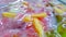 This is a photo of fruit soup or fruit ice with a combination of bright colors that add to the beauty and uniqueness of the photo