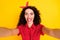 Photo of funky crazy young pretty woman make selfie funny face camera isolated on yellow color background