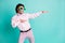 Photo of funky dancing man dressed bow heart shaped sun glasses look empty space isolated on turquoise color background